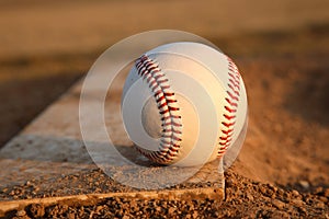 Baseball on Pitchers Mound Rubber photo