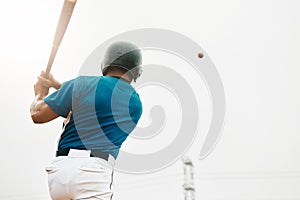 Baseball player, bat and homerun with sky and baseball for sports, game or contest outdoor in summer. Man, sport and hit photo