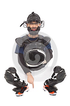 Baseball player , catcher showing one secret signal gesture