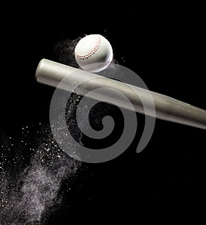 Baseball player hit ball with silver bat and sand soil explode in air. Baseball players in dynamic action hit ball smoke tail.