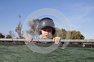 Baseball Player Peeking Over the Dug Out