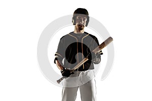 Baseball player, pitcher in a black uniform practicing on a white background.