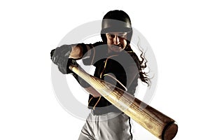 Baseball player, pitcher in a black uniform practicing on a white background.