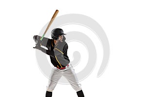 Baseball player, pitcher in a black white sports uniform practicing isolated on a white studio background.