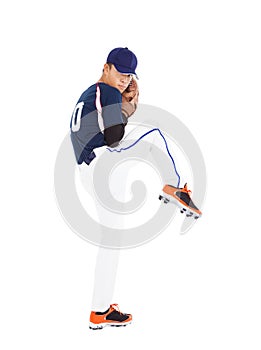 Baseball player pitcher ready pose throwing ball