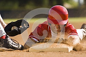 Baseball Player Sliding Into Base