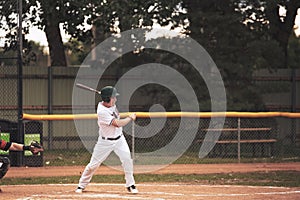 A baseball player swinging the bat