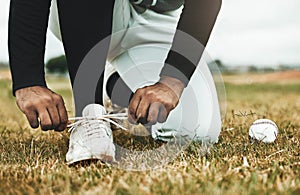 Baseball, shoes and grass with ball and baseball player, sports and fitness closeup during game on baseball field