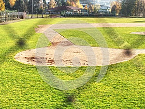 Baseball stadium. Green grass on baseball field