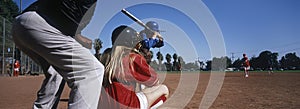 Baseball Team Practicing On Ground With Umpire