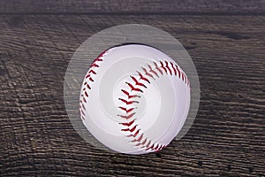 Baseball On A Wooden Background photo