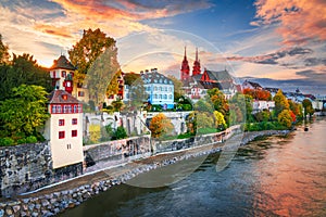 Basel, Switzerland on the Rhine River at Dusk in Autumn photo