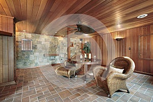 Basement with stone and wood walls