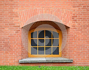 Basement window with a metal barrier