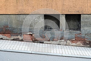 Basement window on the walkway