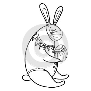 Vector Easter rabbit in safety breathing medical mask with traditional ornate Easter egg in black isolated on white background.