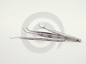 Basic dental tools on white background