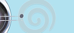 Basic dentist tools , toothbrush, toothpaste and Tooth model on blue Dental background