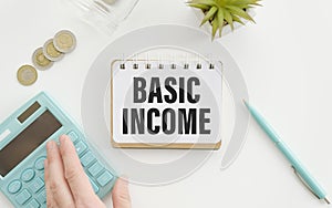 Basic income with cup coffee, concept background