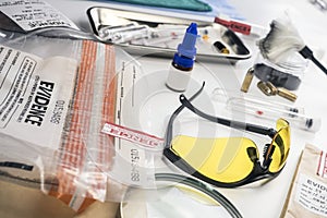 Basic research utensils with a evidence bag in Laboratorio forensic equipment