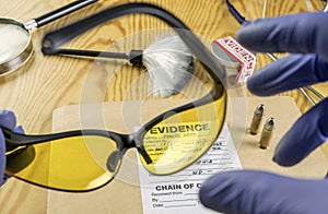 Basic research utensils with a evidence bag in Laboratorio forensic equipment