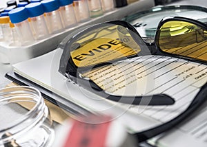 Basic research utensils with a evidence bag in Laboratorio forensic equipment