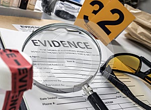 Basic research utensils with a evidence bag in Laboratorio forensic equipment photo