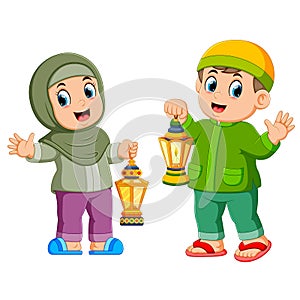 Moslem kids holding lantern photo