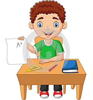 Cartoon little boy holding paper with A plus grade