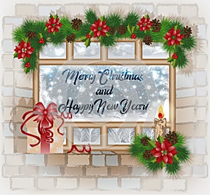 Merry Christmas and Happy New Year window with red flower poinsettia and candle photo