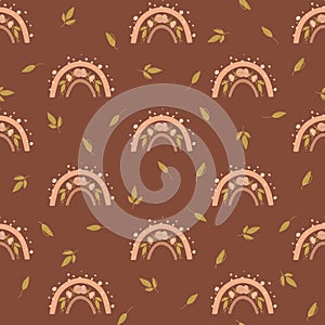 seamless pattern with boho rainbows, flowers, leaves, rosesm, peonies on brown background