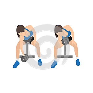 Woman doing Seated Dumbbell concentration curls exercise photo