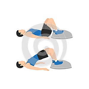 Man doing Bosu ball bridges hip raises. Glute bridges exercise.