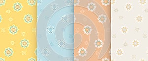 Abstract floral backgrounds collection. Set of seamless patterns with stylised flowers in yellow, blue, brown and grey colors.