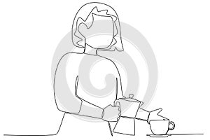 A young woman makes coffee in the morning