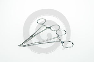 Basic surgical instruments on white background