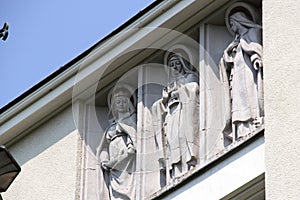 Basilica of Blessed Virgin Mary the Immaculate, detail of the facade, sculptures, Teresin, Masovian Voivodeship, Poland photo