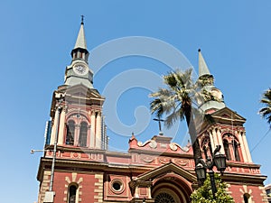 The Basilica de la Merced, with its two pointed domes and intense red color. Built in 1566, it was rebuilt in 1760 after a major