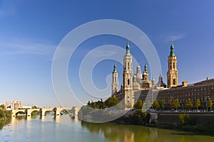 Basilica del Pilar in a bright sunny day on a background of blue