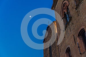 Basilica di San Petronio church building facade and cross on top in Bologna old historical city center photo