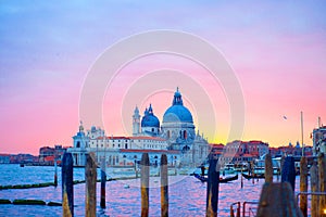 Basilica di Santa Maria della Salute from famous Canal Grande on sunset