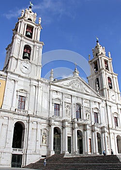 Basilica facade of the Mafra Palace-Convent, built in 18th century in Baroque and Neoclassical styles, Portugal