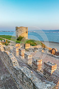 Basilica of the Holy Mother of God Eleusa and the Tower at sunrise in Nessebar ancient city. Nesebar, Nesebr is a UNESCO World