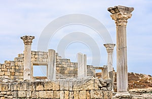 Basilica in the ruins of ancient Greek city of Chersonesus Taurica in the Crimea peninsula under the cloudy sky