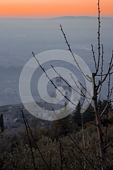 Basilica of Saint Francis of Assisi from hills at sunset