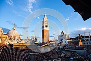 Basilica of Saint Mark and Bell Tower of St Mark`s Campanile Campanile di San Marco in Venice, Italy. Sunrise