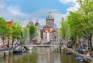 Basilica of Saint Nicholas Sint Nicolaaskerk and Amsterdam canals, Netherlands