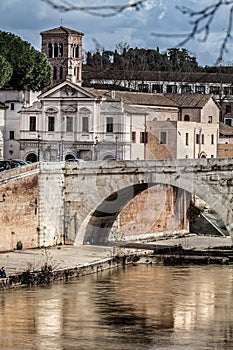 Basilica St. Bartholomew, Pons Cestius, Tiber Island and river. Rome, Italy