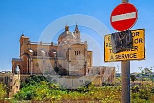 Basilica Of Ta Pinu Behind Sign