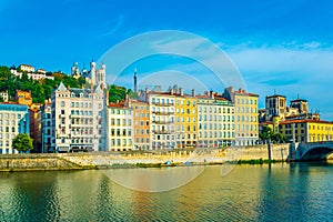 Basilique Notre Dame de Fourviï¿½re and cathedral saint jean Baptiste viewed behind river Saone in Lyon, France